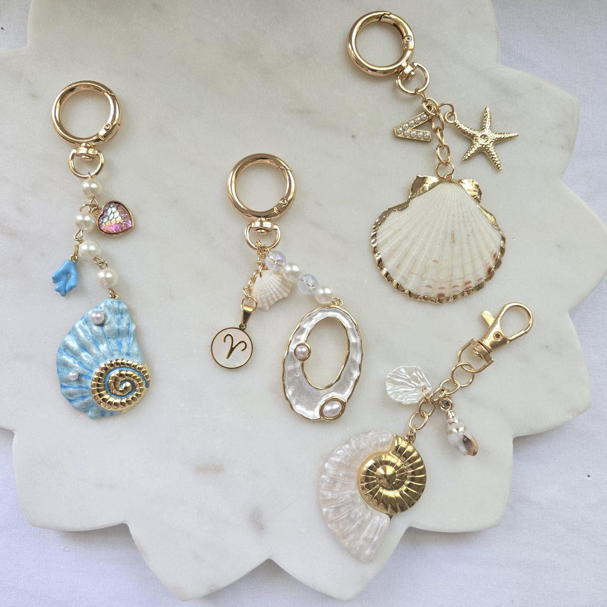 Bag charm with Ocean vibes | one of a kind elegant gold seashell with zodiac sign charm