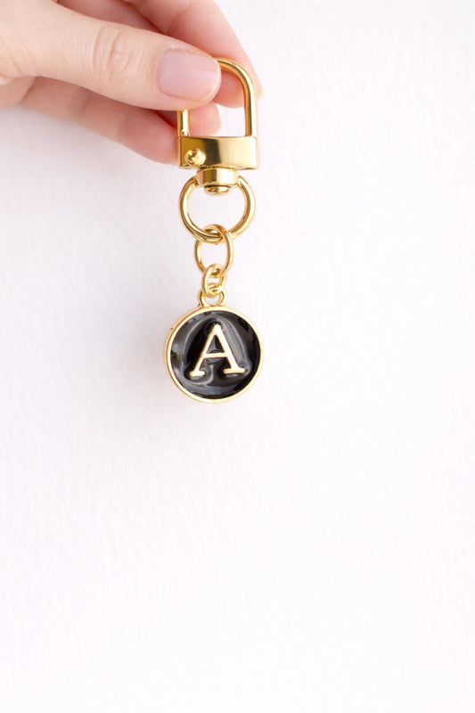 Gold Black Enamel Initial Charm product photo from Rey & Luck Co