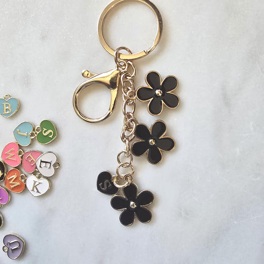 Black Daisy Flower Keychain Edgy Floral product photo from Rey & Luck Co