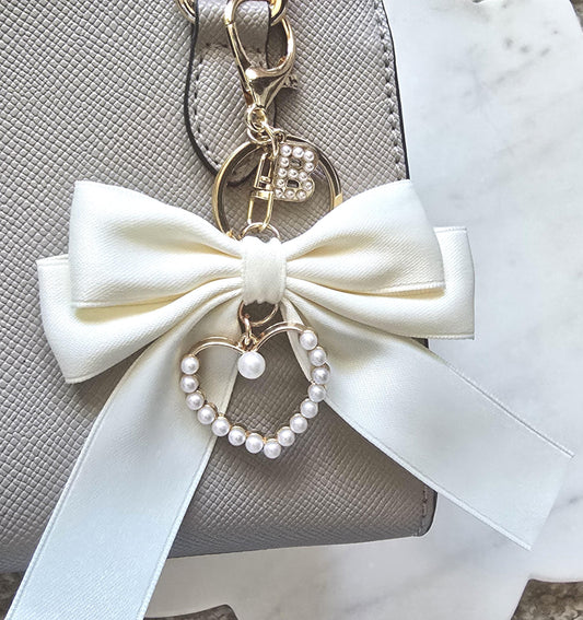 Custom Initial Cream Silky Bow Keychain Pearl Heart product photo from Rey & Luck Co