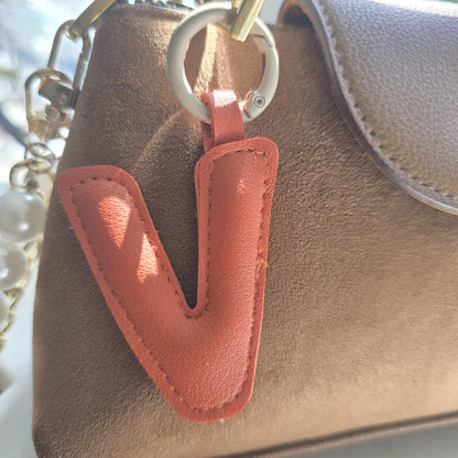 Custom Initial Bag Charm faux leather, product photo 3 from Rey & Luck Co